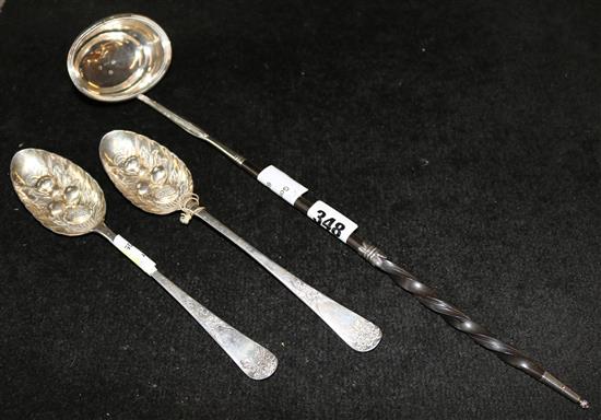 Pair of George III later embossed berry spoons and a George III silver punch ladle, with baleen handle (3)